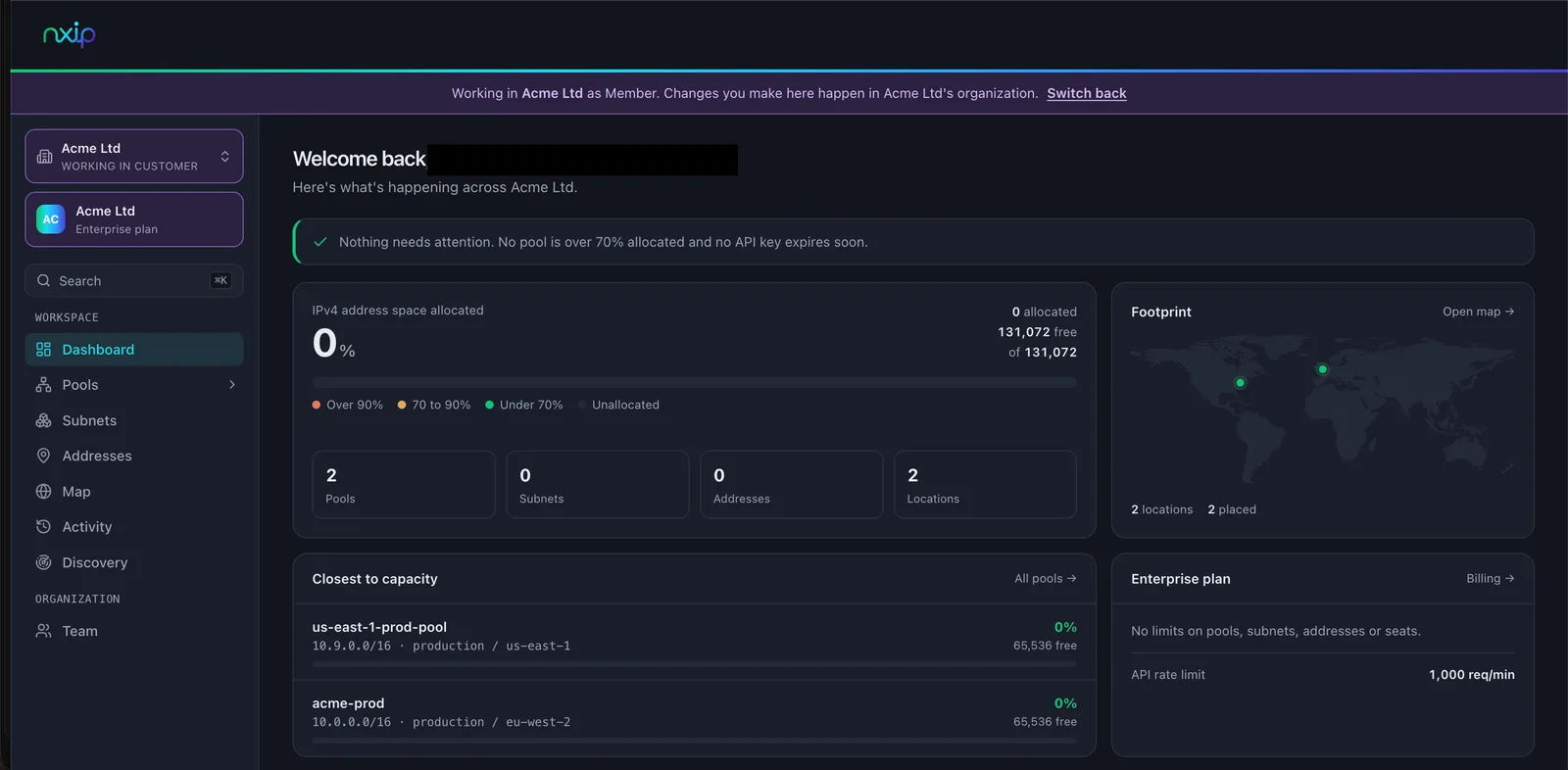 The nxip dashboard for Acme Ltd, with a banner across the top reading "Working in Acme Ltd as Member. Changes you make here happen in Acme Ltd's organization" next to a Switch back link. Below it, Acme Ltd's own pools: us-east-1-prod-pool on 10.9.0.0/16 and acme-prod on 10.0.0.0/16.